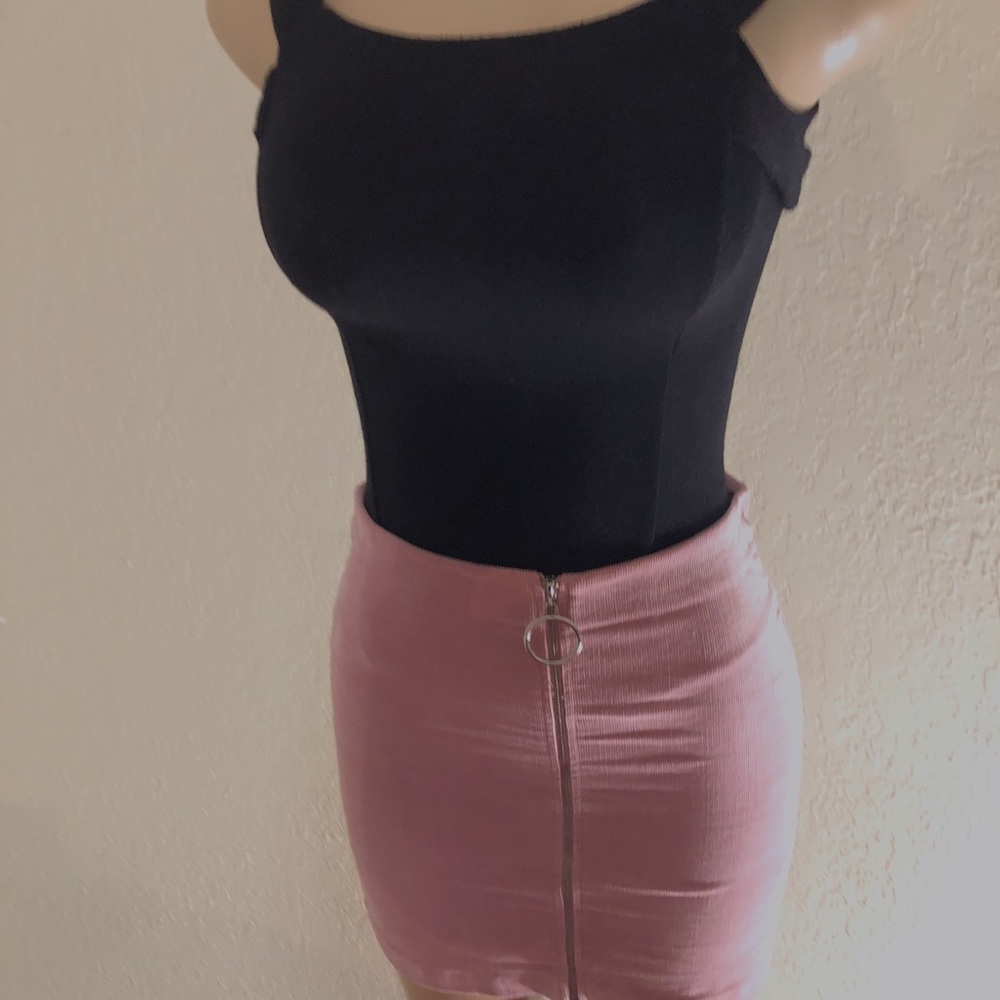 Black shirt and pink skirt